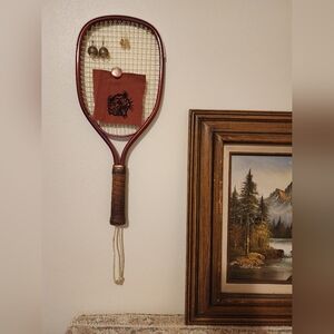 Vintage Red Tennis Racket with Brown Grip